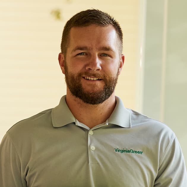 Virginia Green sales and customer service team member in a branded polo shirt
