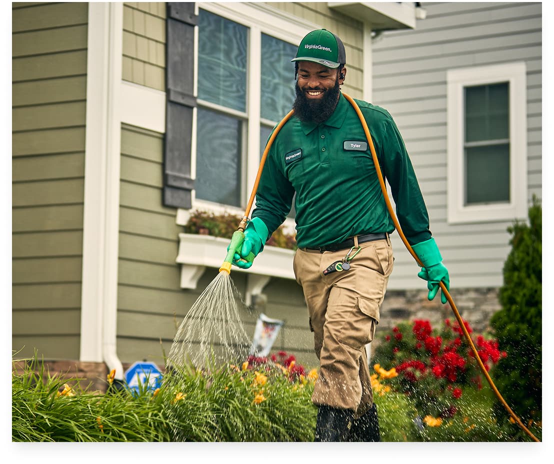 Virginia Green Leader treating a lawn.